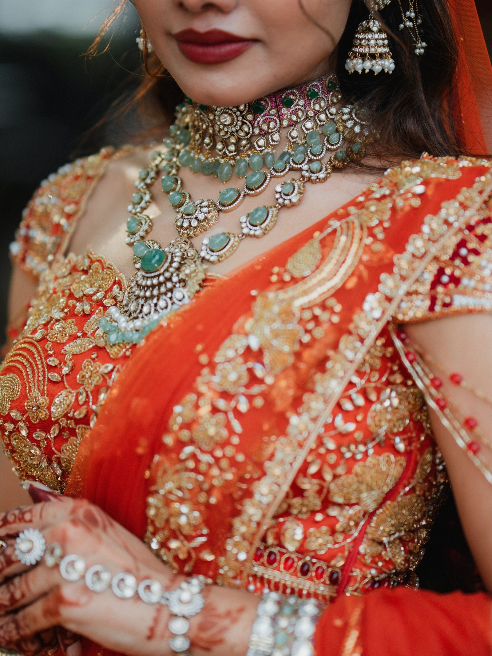 Close-up of a layered kundan and jadau kemp choker stack