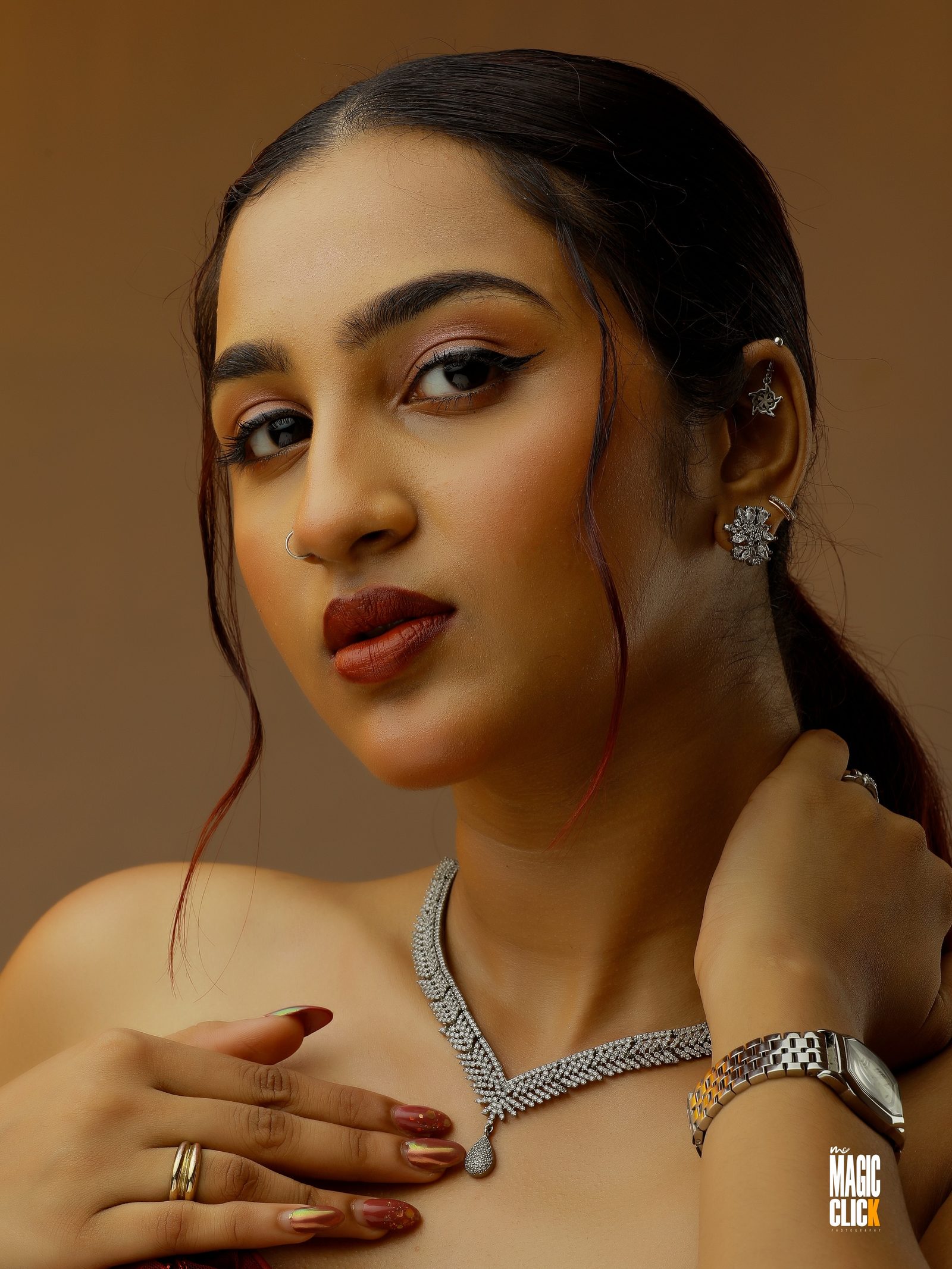 A modern bride wearing a delicate diamond Victorian statement necklace